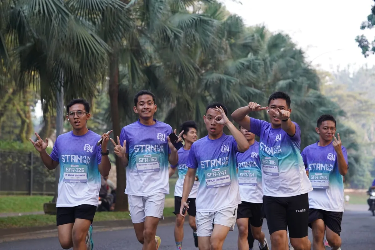 Peserta STAN Fun Run mengenakan jersey hasil produksi MOTIVE